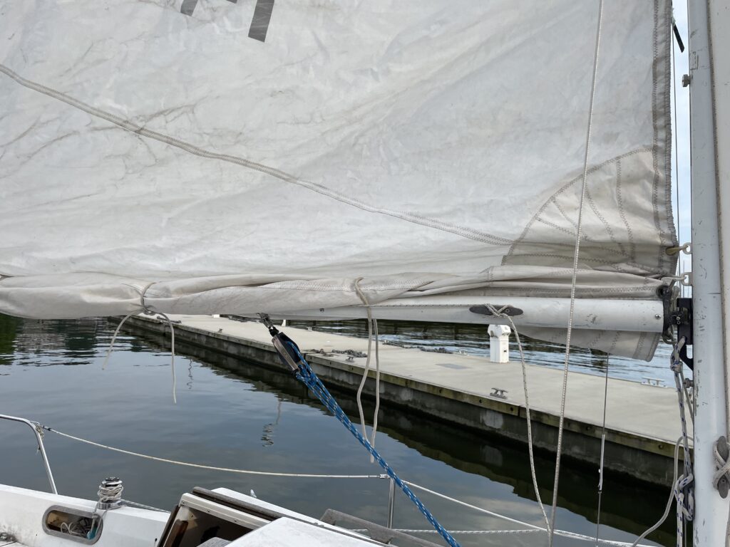 cleat on the boom for the reefing line